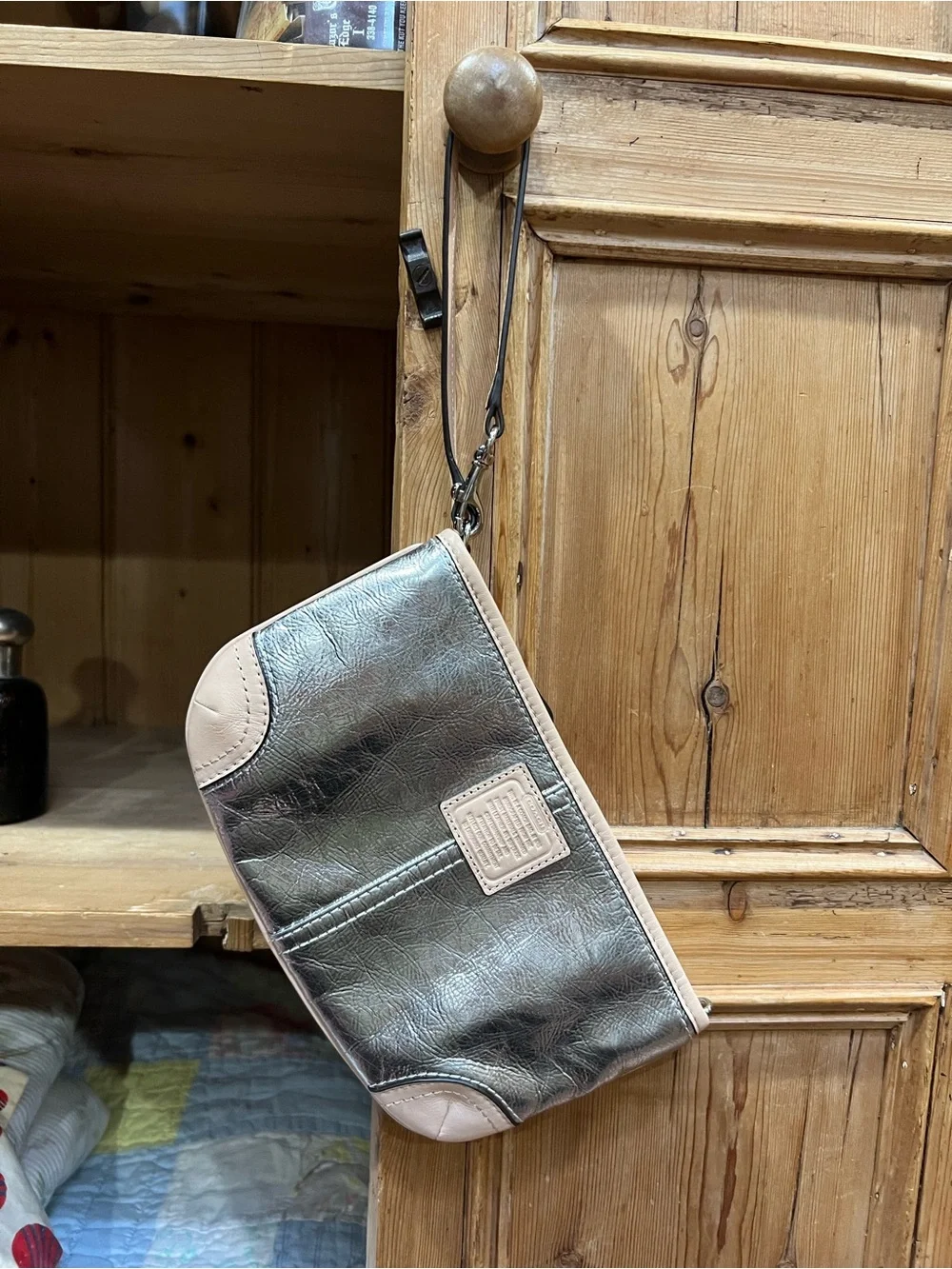 Coach wristlet metallic